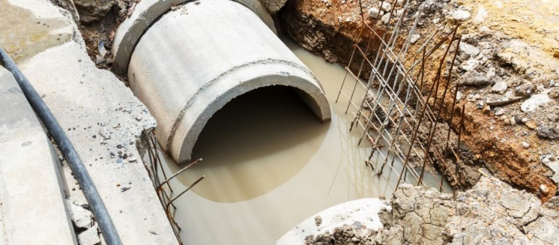 Sewer installation in city Close up sewer installation in city